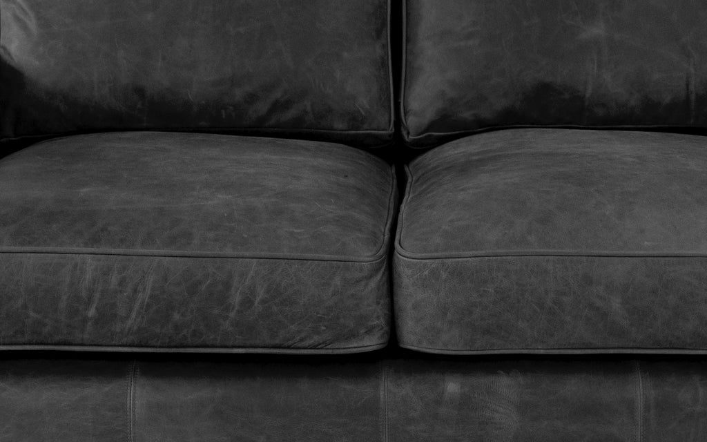 Black leather best sale sofa harveys